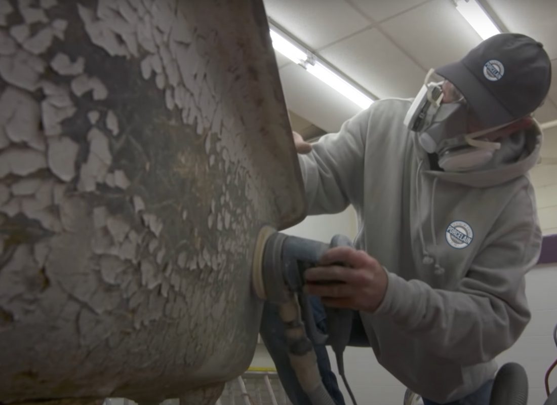 Expert team from Porcelain Patch & Glaze performing detailed bathroom tub refinishing in an Essex County residence